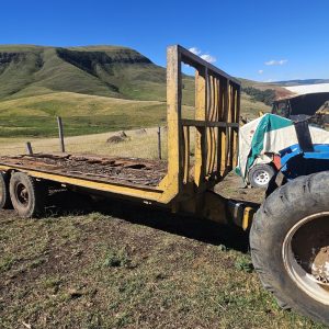 2x Bell double axle 18 ton timber tip trailers